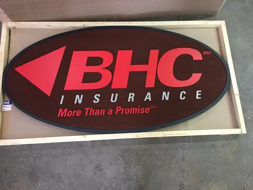 BHC Insurance black and red logo sign