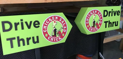 Chicken Salad Chick drive-thru directional signs